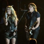 NASHVILLE, TN - NOVEMBER 06:  Miranda Lambert and Keith Urban perform onstage during the 47th annual CMA Awards at the Bridgestone Arena on November 6, 2013 in Nashville, Tennessee.  (Photo by Rick Diamond/Getty Images)